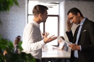 insurance claim concept man arguing with professional